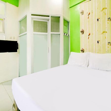 Oyo Life 3103 Opo Homestay & Kost Malang Extérieur photo